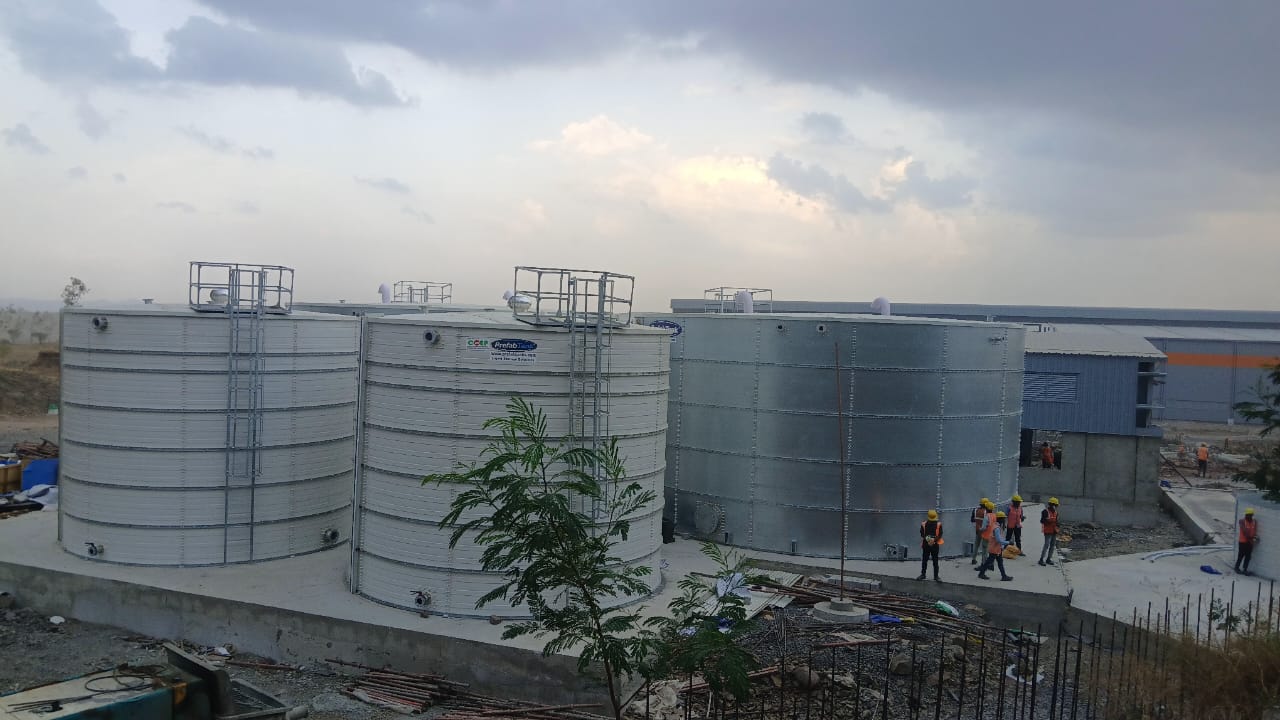 White and grey Zinc Aluminium Steel tanks installed at an industrial project site