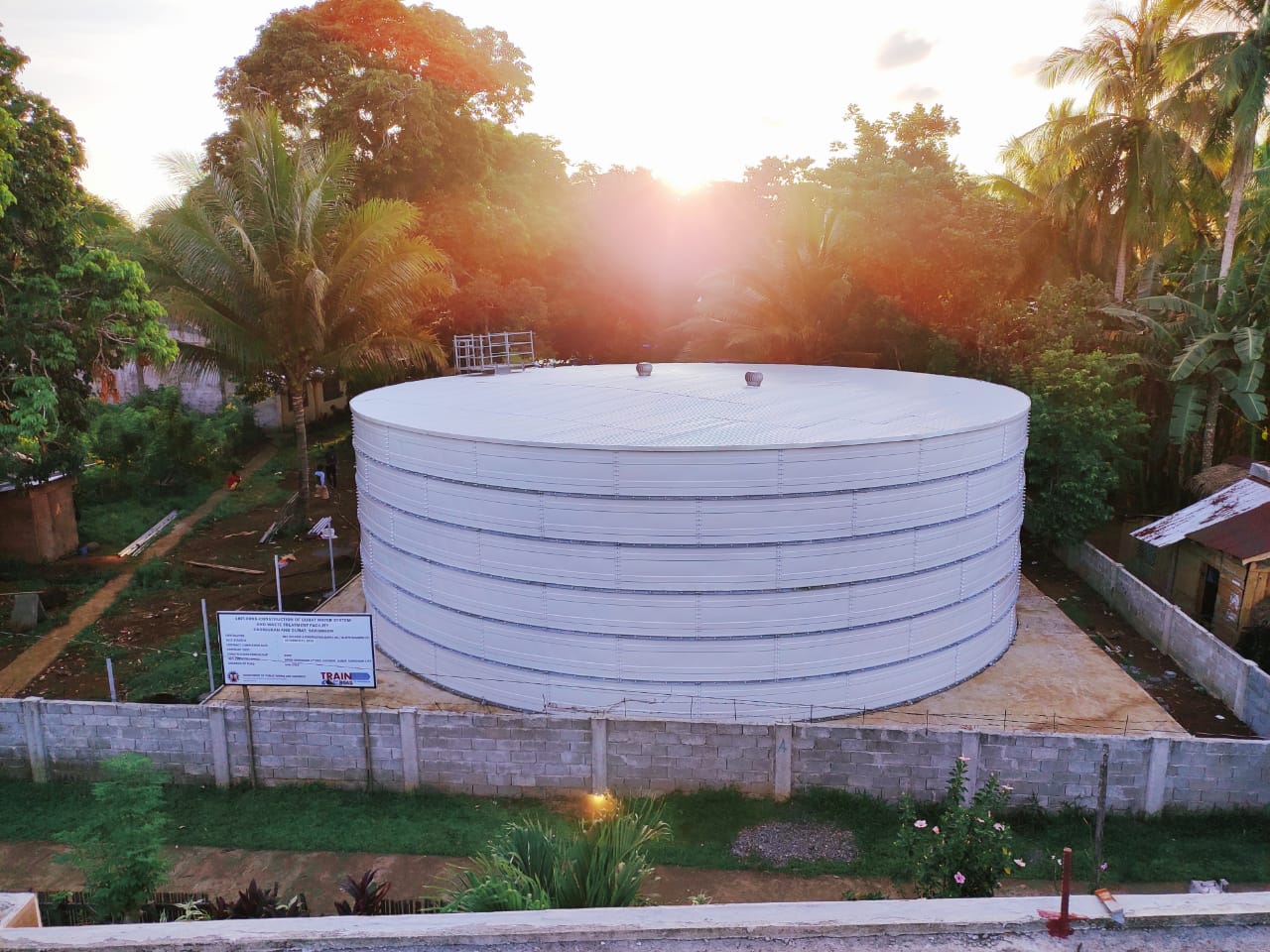 Grey Zinc Aluminium Steel tank with ladder and PrefabTank branding