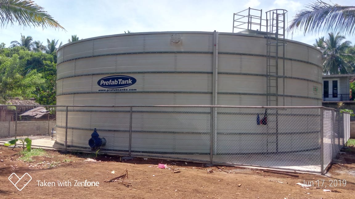 Multiple Zinc Aluminium Steel tanks installed on an elevated commercial structure