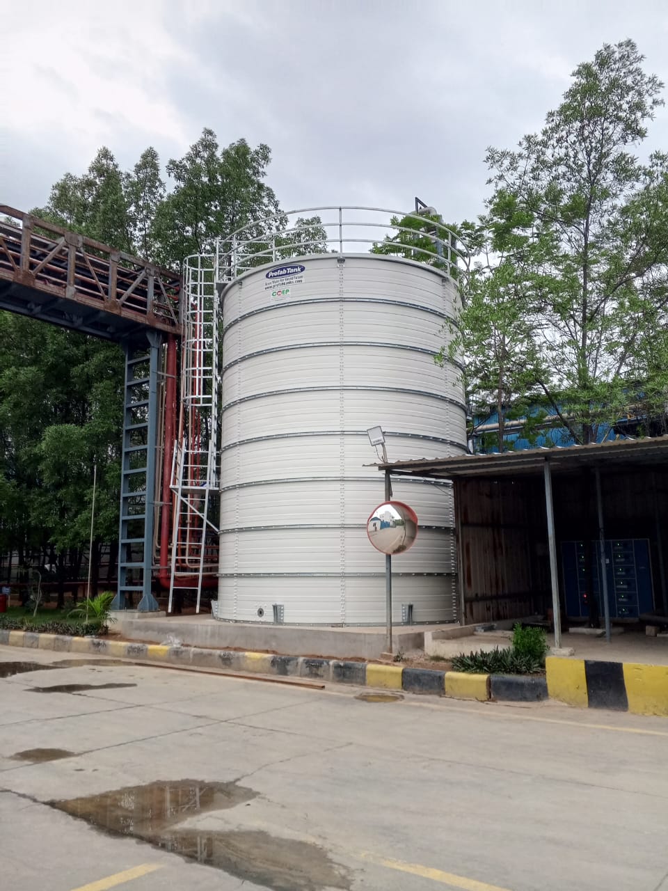 Three Zinc Aluminium Steel tanks installed on a raised building platform