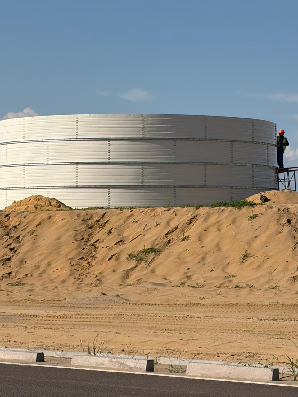 White Zinc Aluminium Steel tank viewed from above in a valley project